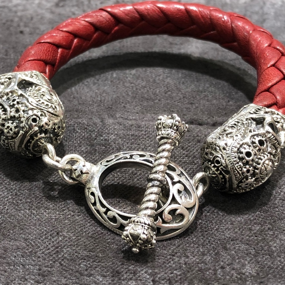 Breaded leather with sterling silver skull